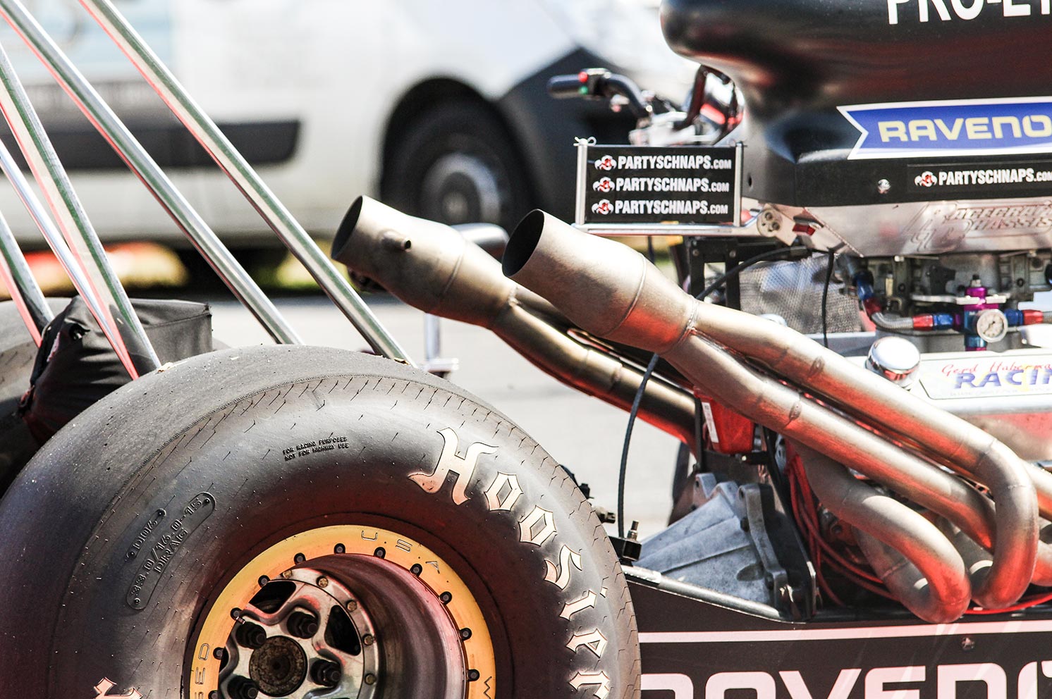 G&V Venture Brands Agency | Cropped image of a dragster wheel and engine