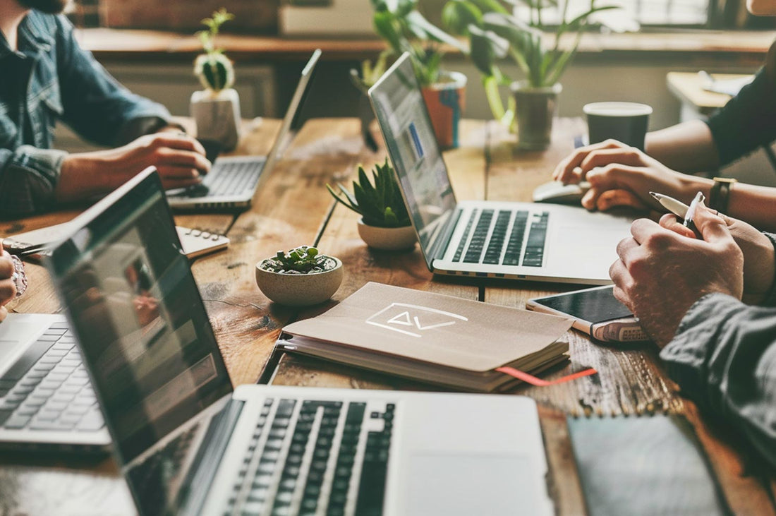G&V | Venture Brands Agency | Laptops on a table in a creative meeting space